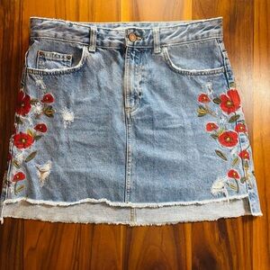 Zara Basic Embroidered Denim Skirt – Distressed Floral Detail, High-Low Hem